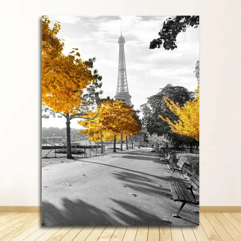 A framed DecorBites™ nordic landscape canvas print featuring black and white Eiffel Tower with yellow autumn trees