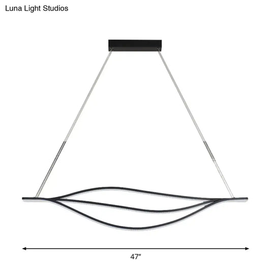 Modern black led lightbulb pendant light with curved metallic leaf-like strips suspended from silver cables