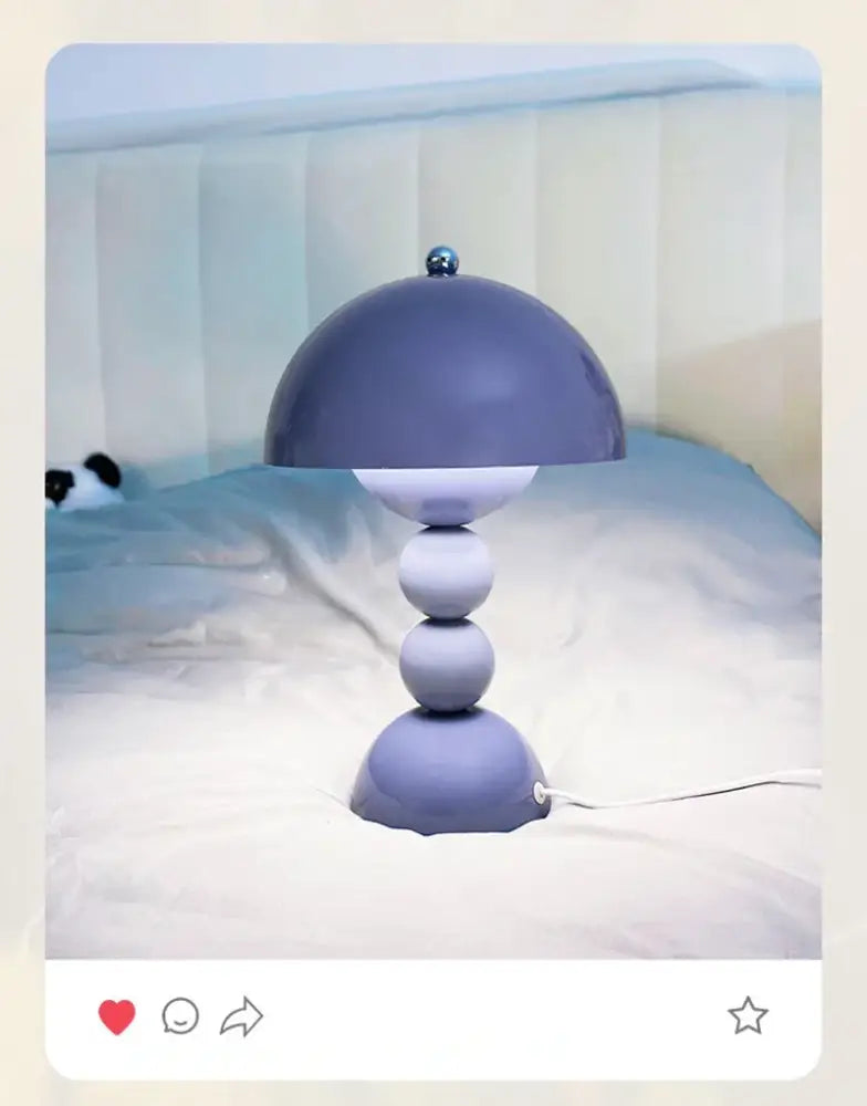 A sleek nordic led table lamp in muted purple with dome shade and usb dimmable stacked spherical bases for home decor