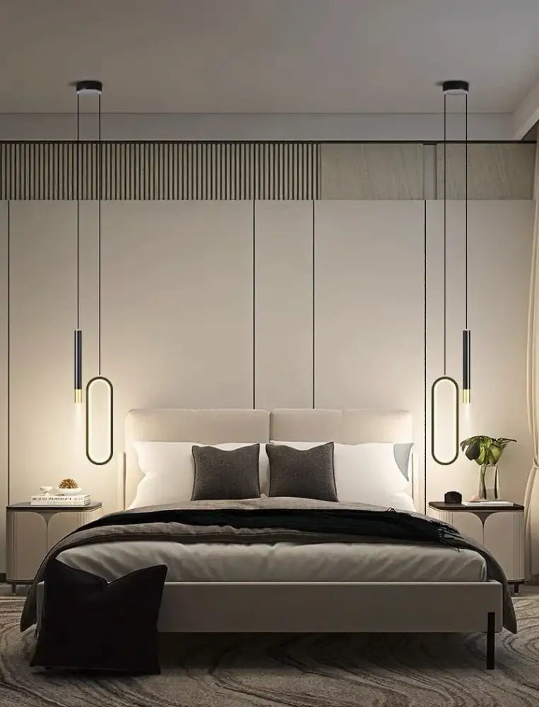 Modern minimalist bed with light beige upholstered headboard and frame paired with decorbites™ nordic led pendant light