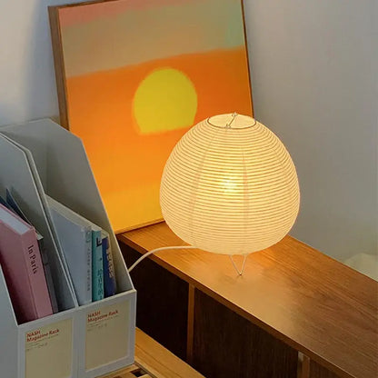Warmly glowing decorbites nordic led table lamp with spherical paper lantern and minimalist wire stand for home decor