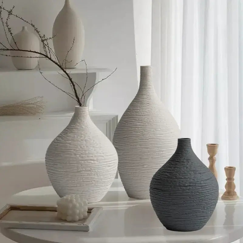 Decorbites™ nordic luxury ceramic vase with a textured ribbed surface and rounded white ceramic body for home décor