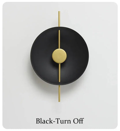 DecorBites™ Nordic modern wall sconce in black matte finish with gold-toned rod and disc accent for modern wall decor