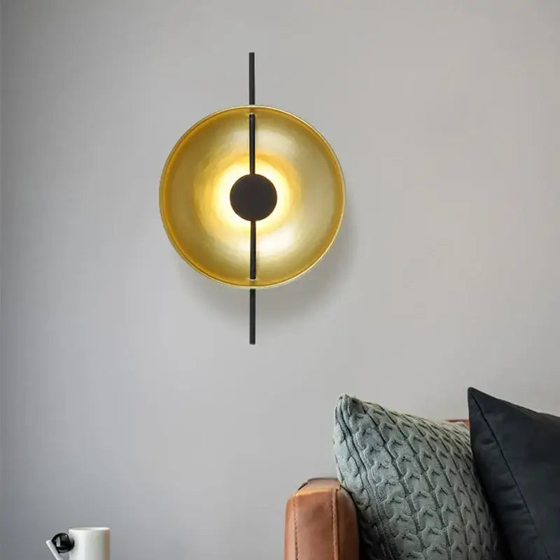 DecorBites Nordic modern wall sconce gold-toned circular design with black central rod for modern wall lighting