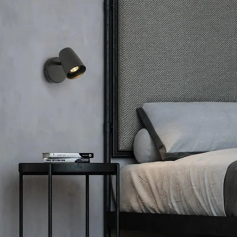 A sleek matte black decorbites™ nordic modern wall sconce spotlight with a minimalist design for modern wall decor