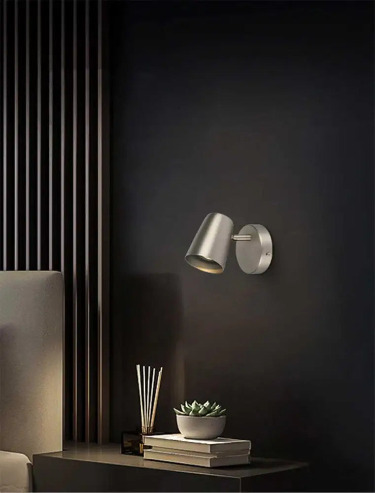 DecorBites™ Nordic modern wall sconces featuring a sleek brushed metallic finish and adjustable modern wall spotlight