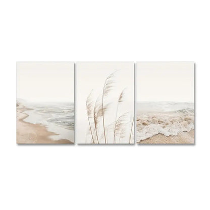 Beige and white nordic seascape canvas wall art set featuring tall reeds against a misty shoreline triptych