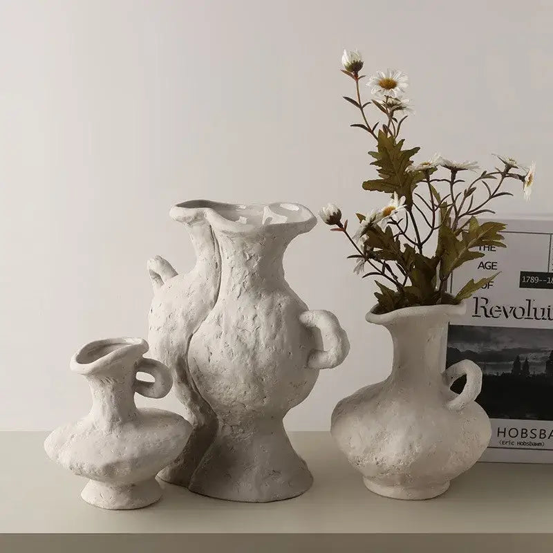 DecorBites™ nordic style ceramic flower pot set with three textured off-white vases with handles and irregular shapes
