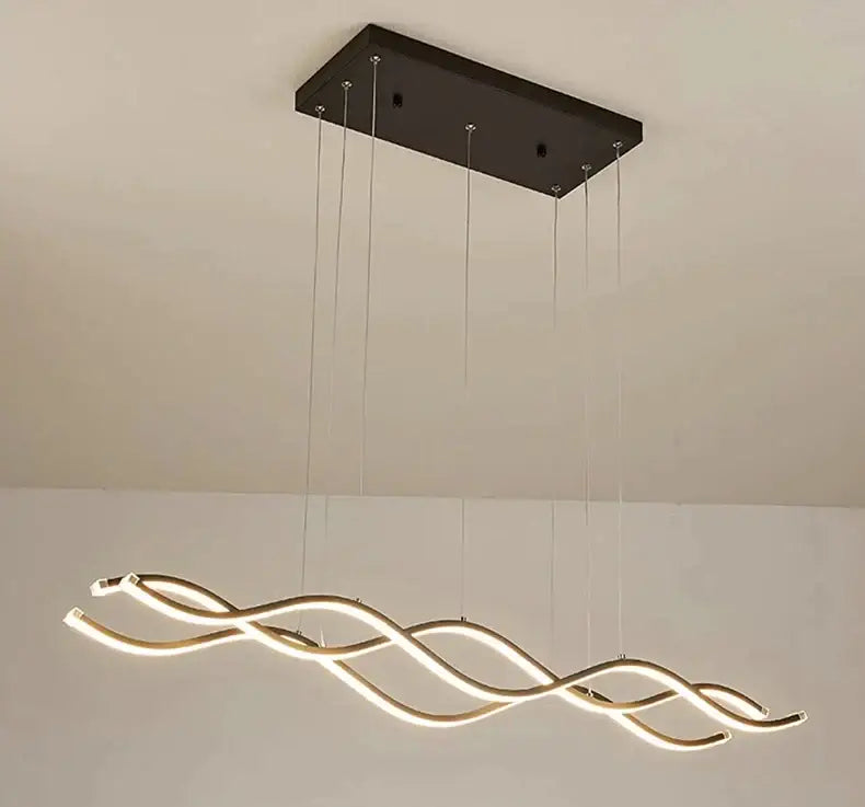Modern minimalist pendant light with black mount and glowing gold led strips for nordic style dining room decor