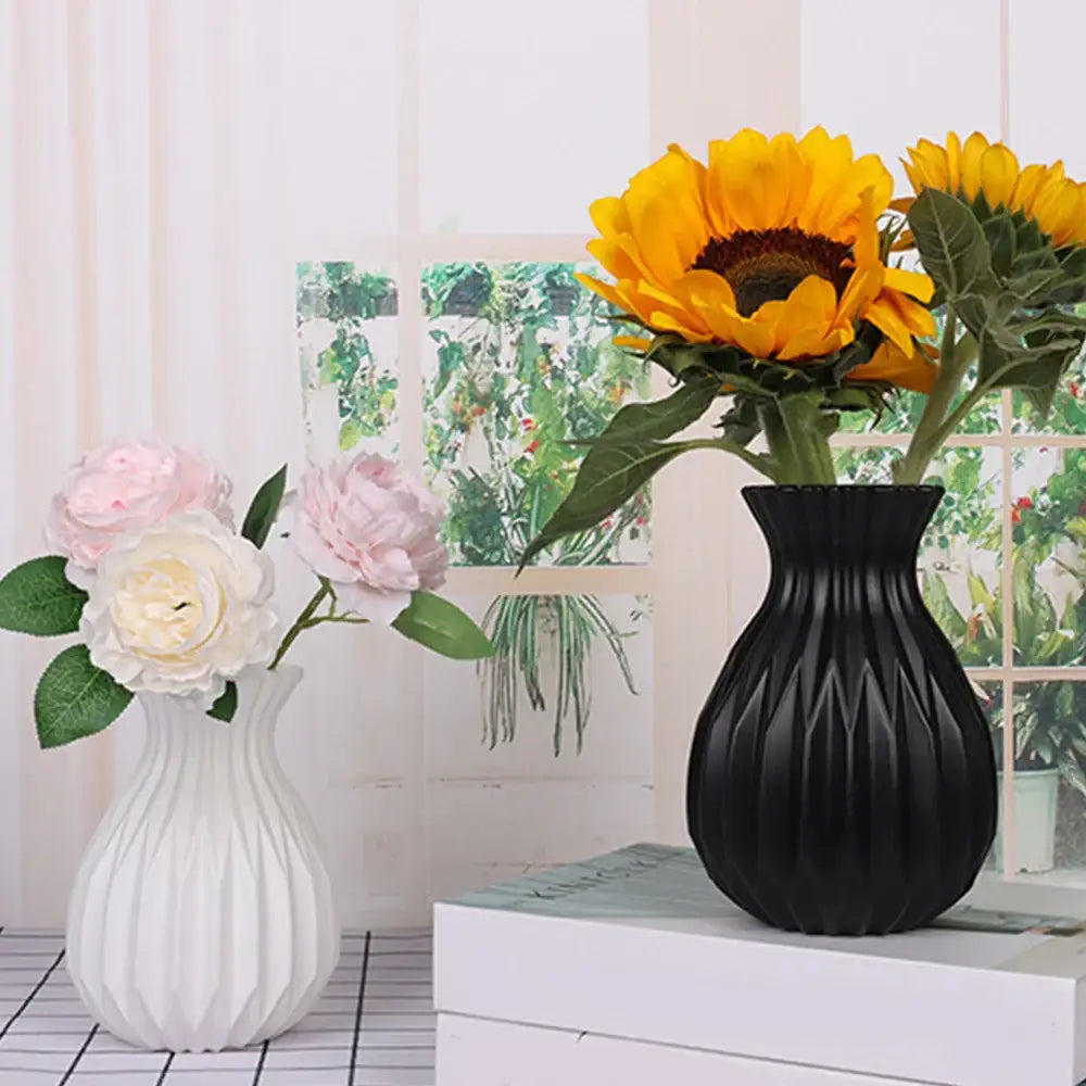 Black ribbed ceramic flower vase with vibrant yellow sunflowers for home decor by decorbites nordic style plastic flower vase