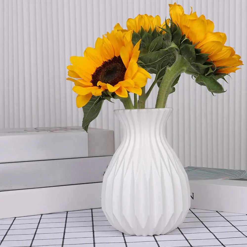 DecorBites™ nordic style white ribbed plastic flower vase holding vibrant yellow sunflowers for home decor
