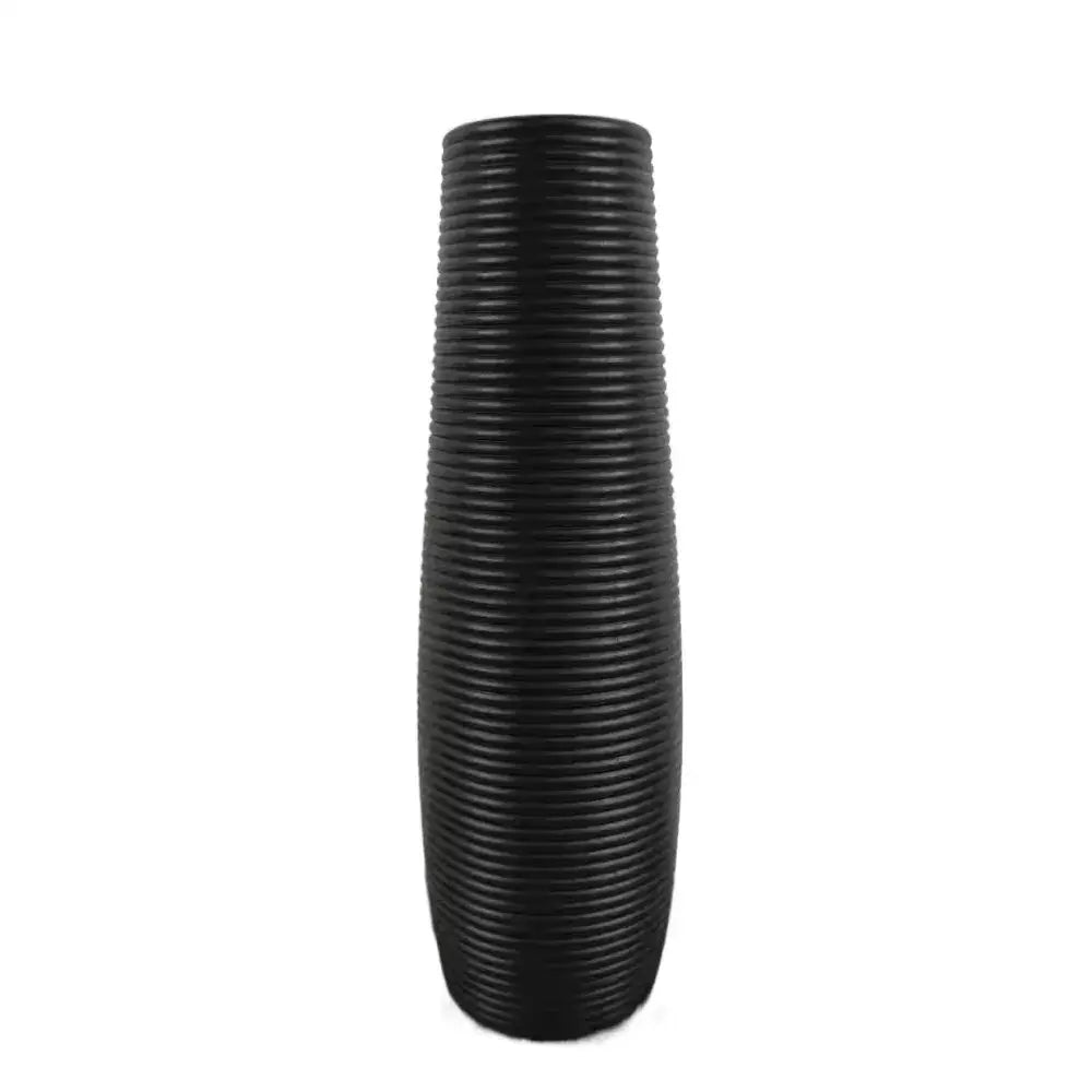Black ribbed ceramic flower vase with tall slender profile for plastic flower display in decorbites nordic style collection