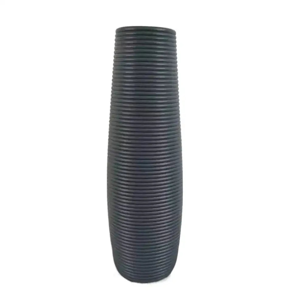 Dark gray ceramic flower vase with tall slender shape and vertical ribbed texture for plastic flower decor by decorbites