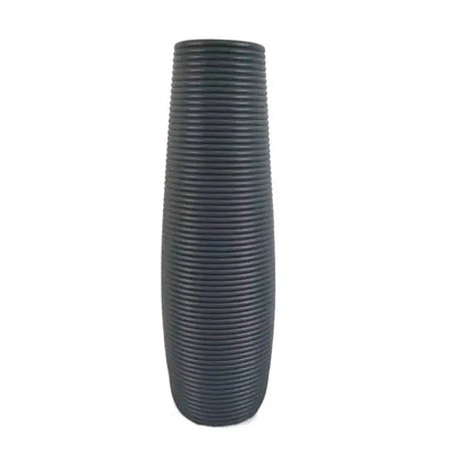 Dark gray ceramic flower vase with tall slender shape and vertical ribbed texture for plastic flower decor by decorbites
