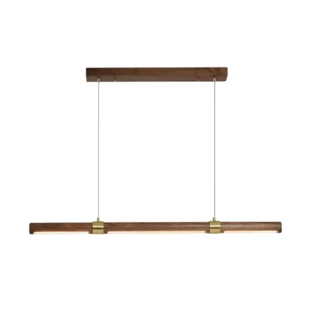 Modern minimalist wood island pendant with rectangular wooden frame and brass accents for dining table lighting