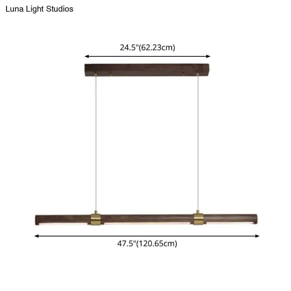 Modern rectangular wood island pendant light in brown with dark wood finish and brass accents for dining table use