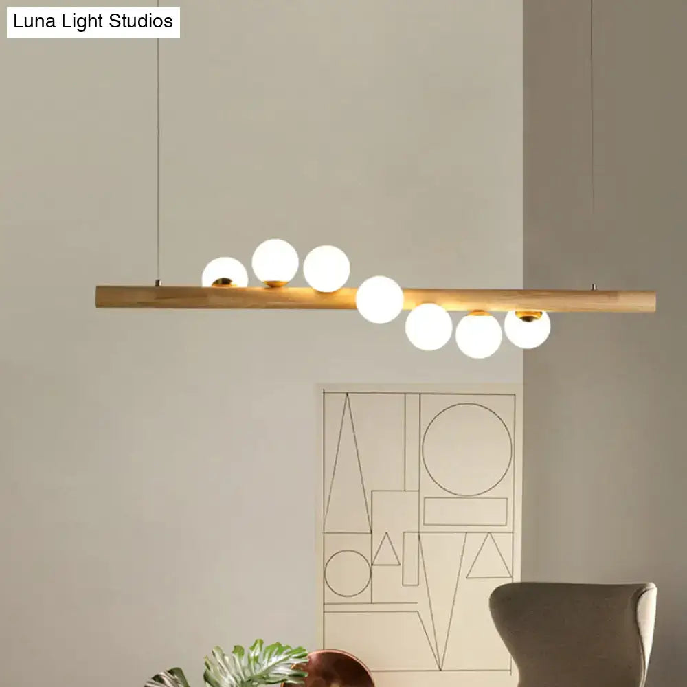 DecorBites™ nordic wood island pendant with beige wooden bar and globe glass bulbs for dining room chain cord length