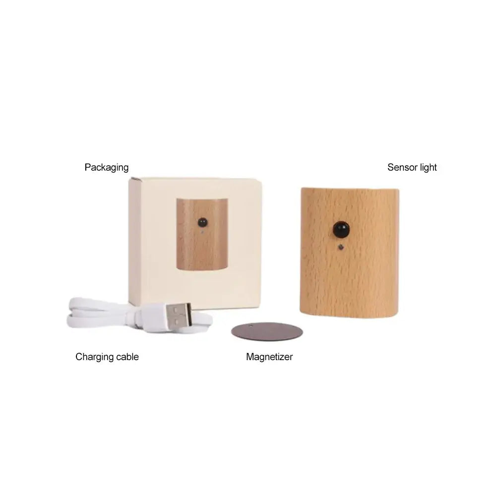 Lightweight wooden cylindrical decorbites odin battery operated wall sconce with black circular lens and small sensor dot