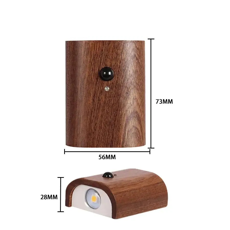 A sleek dark brown wooden motion sensor battery operated wall light with rounded edges by decorbites odin