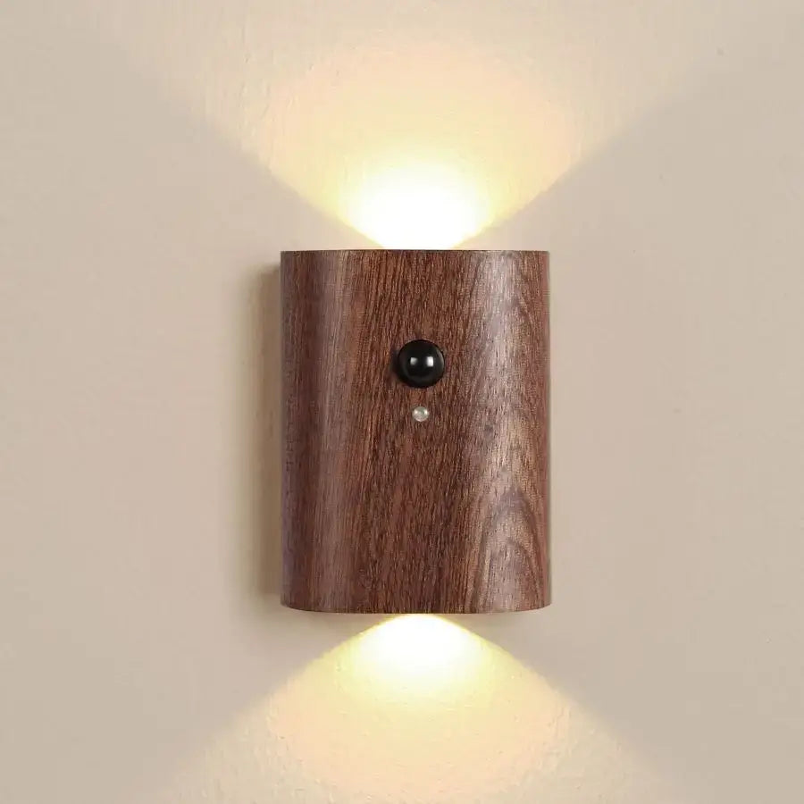 Decorbites odin warm-toned wooden battery operated wall sconce with sleek cylindrical design and motion sensor