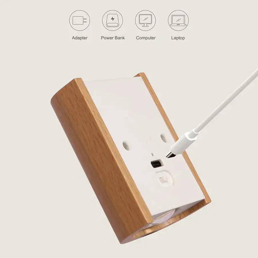 Wooden-framed white power bank with usb-c cable plugged in for decorbites battery operated wall sconce charging