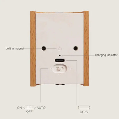 Wooden-framed white battery operated wall sconce with minimalist design and built-in magnet by decorbites odin
