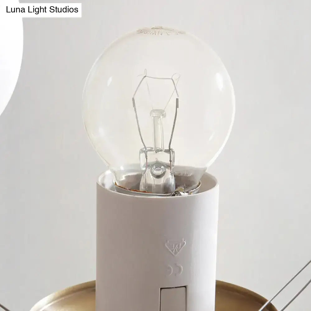 Clear glass globe light bulb with visible filament in white socket base for decorbites opal glass chandelier light
