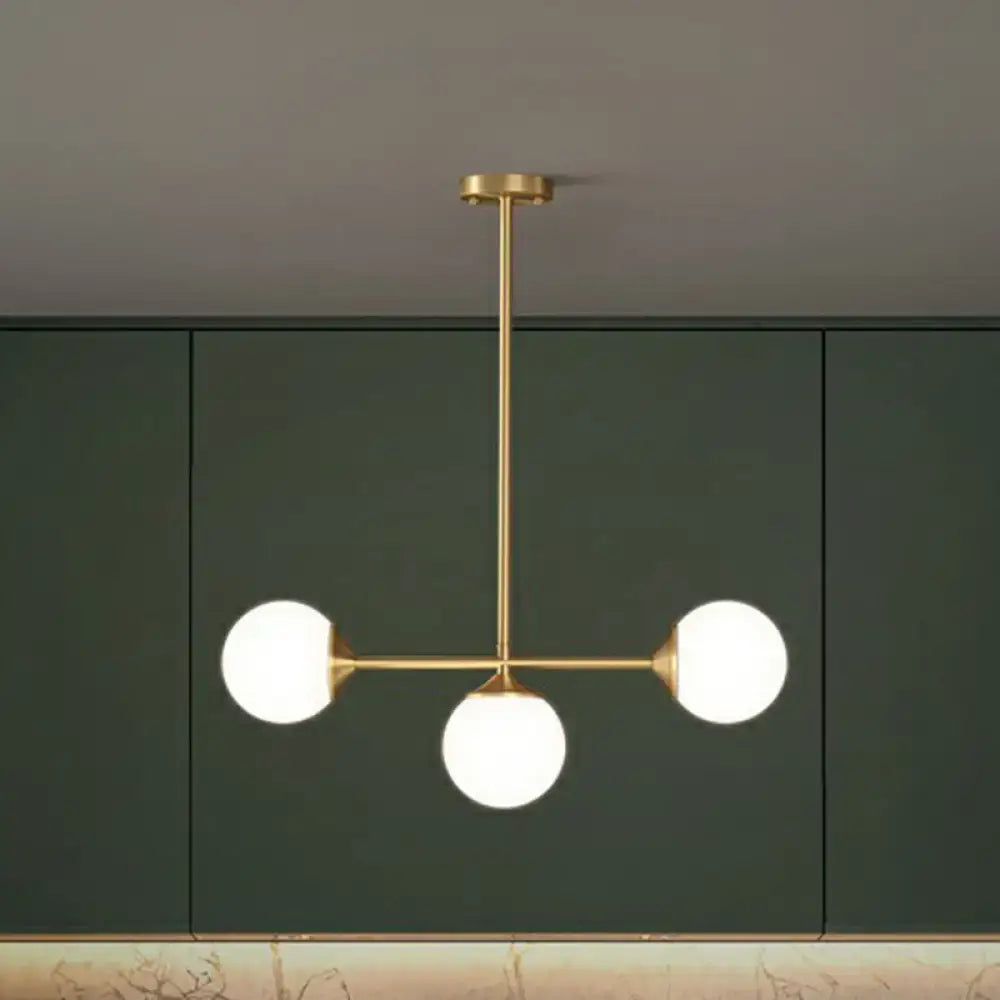 Gold-toned decorbites opaline glass ball pendant light with three frosted bulbs for minimalist dining room island