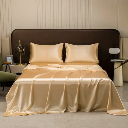 Beige satin bedding set by decorbites featuring a smooth glossy finish with matching flat sheet and pillowcases