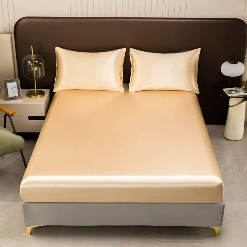 Cream-colored satin flat sheet with smooth glossy finish from decorbites™ opulent solid color satin bedding set