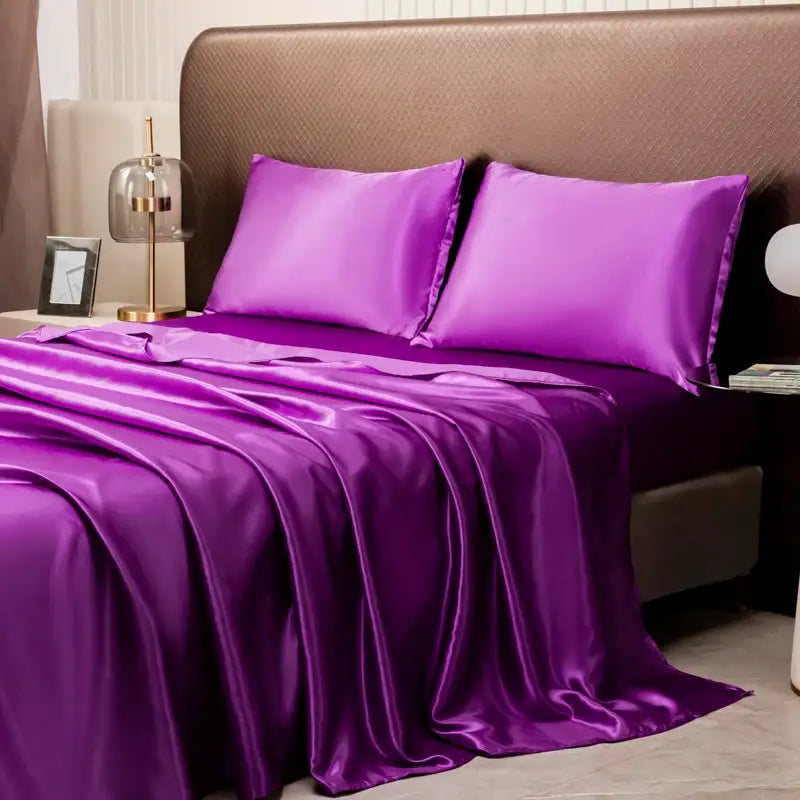 Lustrous purple satin bedding set with matching pillowcases from decorbites opulent solid color satin bedding set