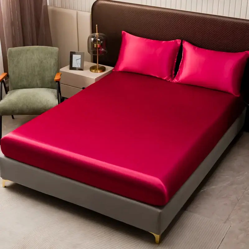 Decorbites™ opulent solid color fuchsia satin bedding set with flat sheet draped on a gray modern bed frame
