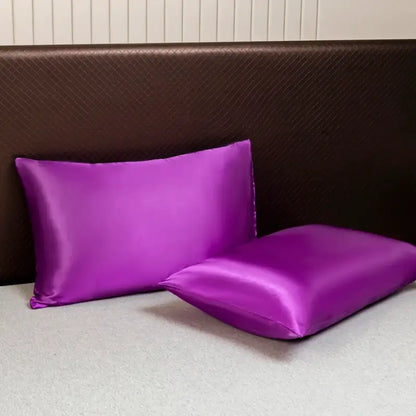 Vibrant purple satin pillowcases with a smooth glossy finish from decorbites™ opulent solid color satin bedding set