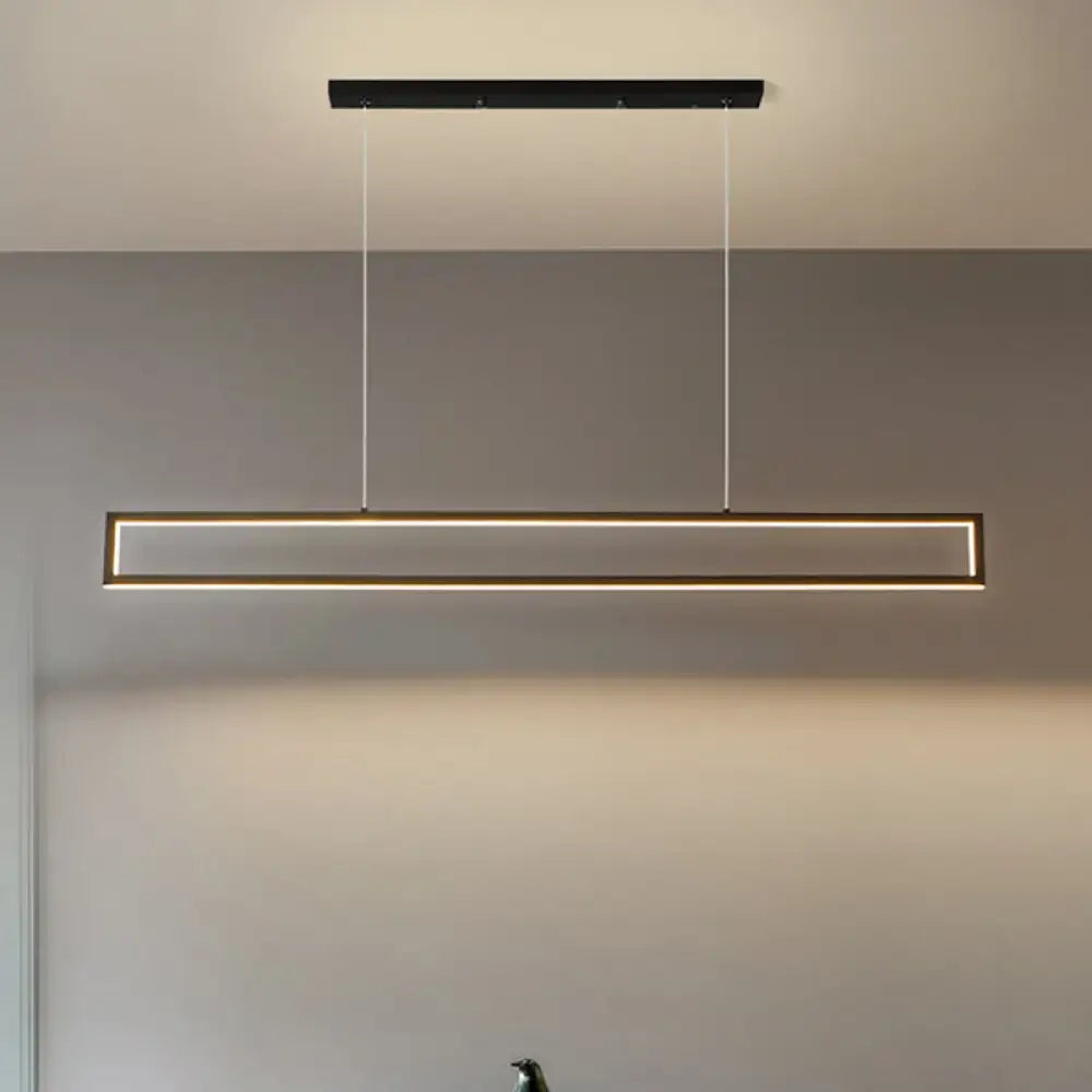 Modern rectangular led island pendant light with sleek aluminum black ceiling frame and warm natural light illumination