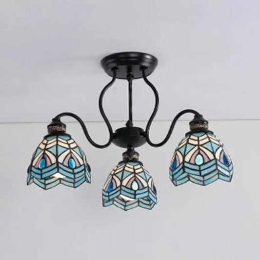 Stylish DecorBites™ peacock stained glass semi flush light with black metal frame and three blue teal shades