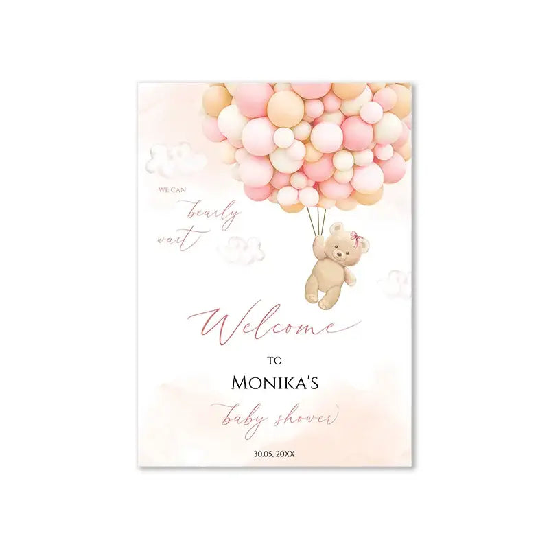 A soft beige teddy bear with a pink bow floating among pastel balloons in a decorbites teddy bear baby shower sign