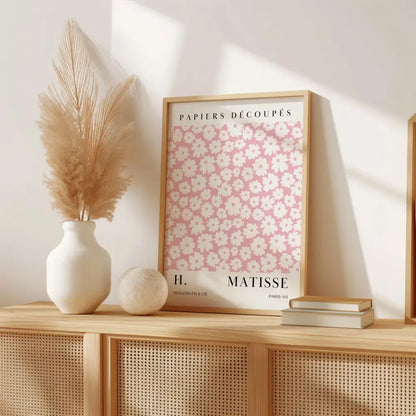 A framed wall art set featuring pink abstract sage colors with white floral patterns labeled papiers découpés by h