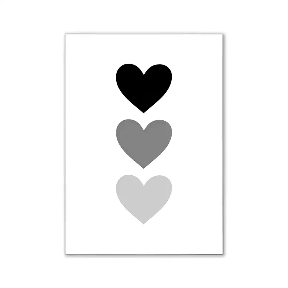 A minimalist pink aesthetic wall art print with three vertically stacked black and gray hearts for modern room decor