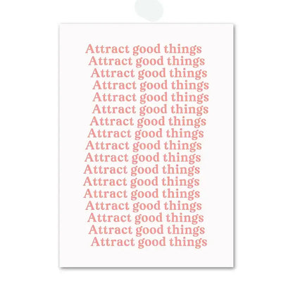 Decorbites™ pink angel number poster featuring a minimalist white rectangular print with pink angel phrase attract good things