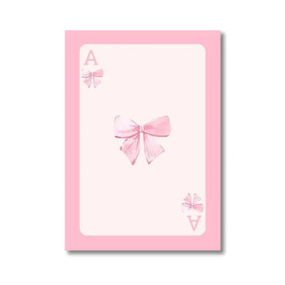 DecorBites pink bows wall art set features a delicate pink playing card with central and corner bow illustrations