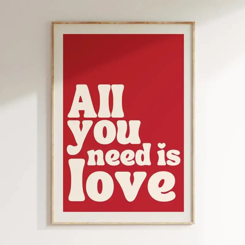 Decorbites™ pink red framed wall art canvas with bold white retro font reading all you need is love lyrics design