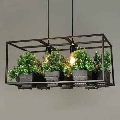 Decorbites™ planter light chandelier black metal industrial style with four glowing bulbs and green plants in gray containers