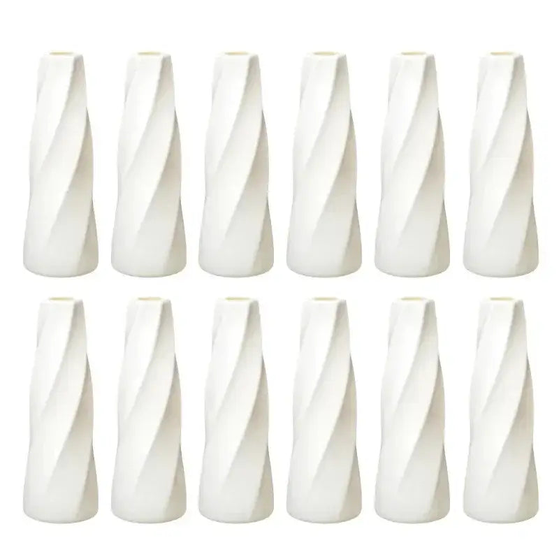 Set of ten white plastic flower vases with a sleek twisted spiral design from decorbites plastic flower vases collection