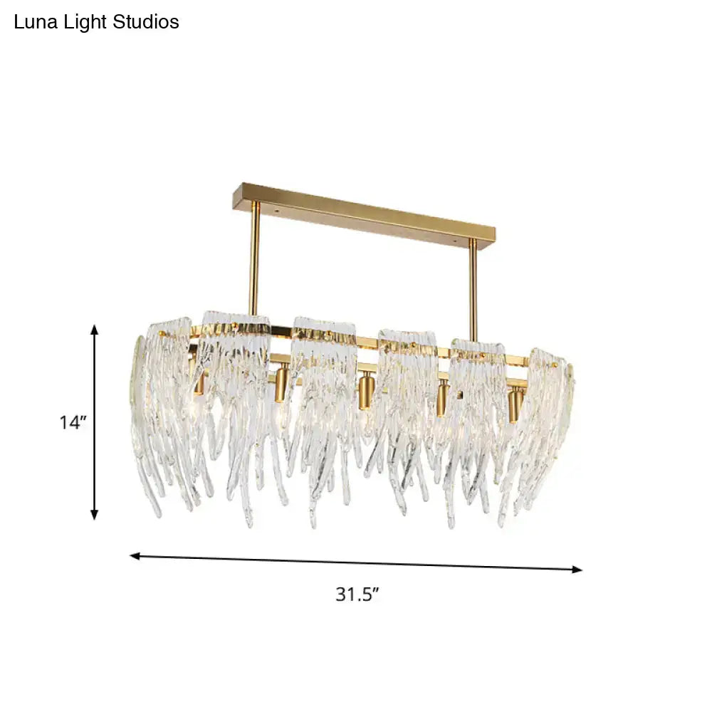 Gold-toned DecorBites™ postmodern crystal island pendant light with cascading clear prisms for dining room down lighting
