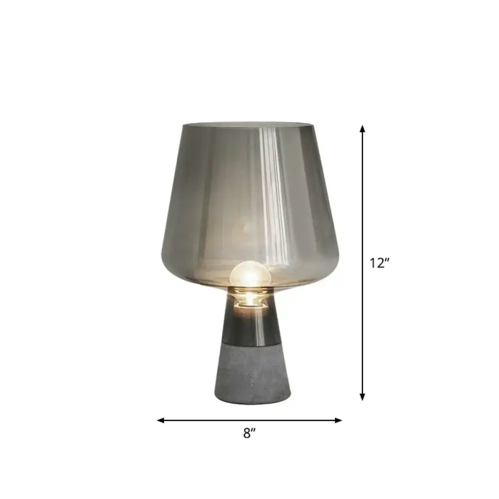 DecorBites postmodern glass table light with smoke gray translucent shade and cement base featuring metallic accent band