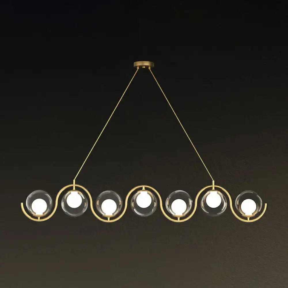 Decorbites™ postmodern hanging lamp with gold-toned metal arms and clear glass shade featuring five spheres