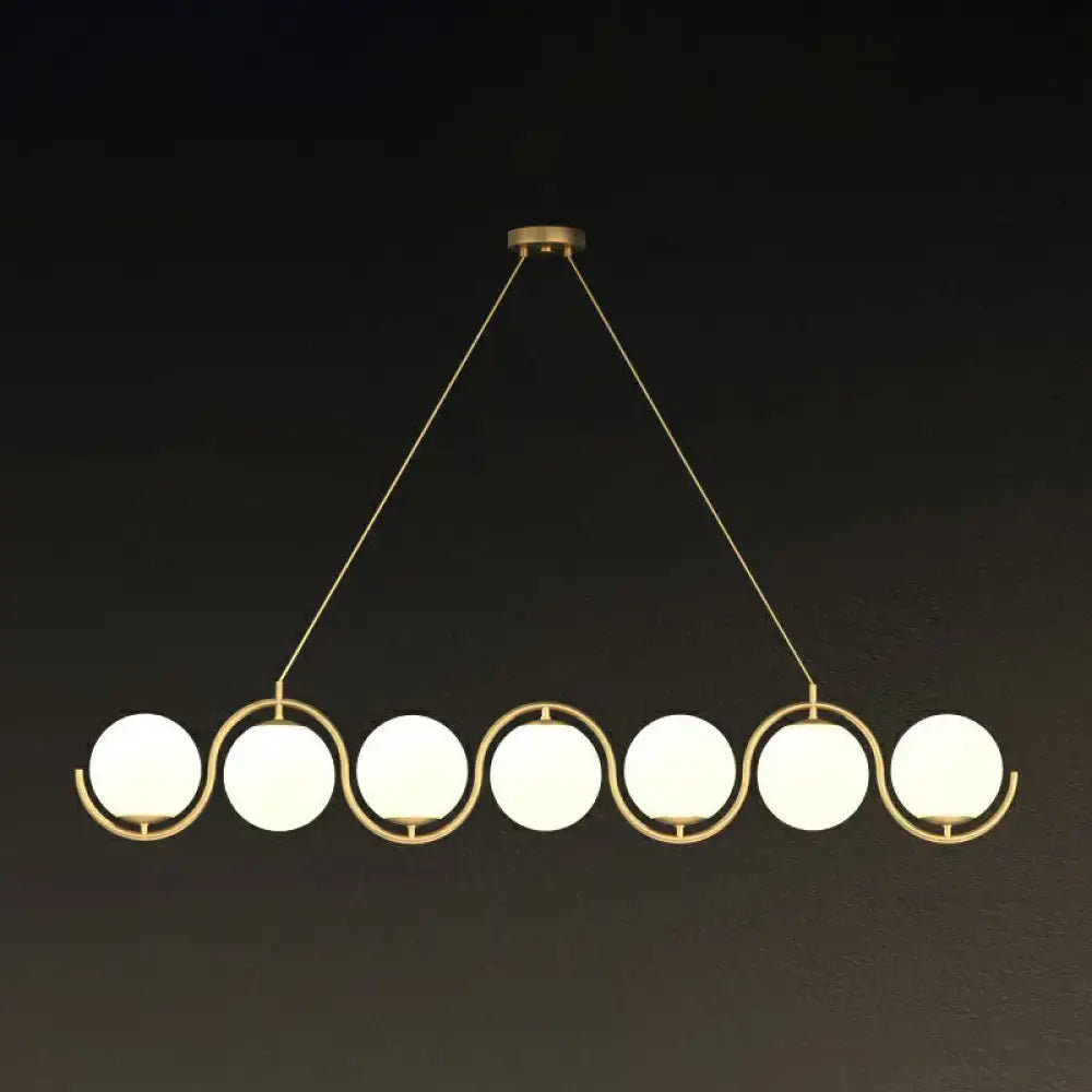 DecorBites postmodern island hanging lamp with gold-toned metal and clear milk white glass shade globes