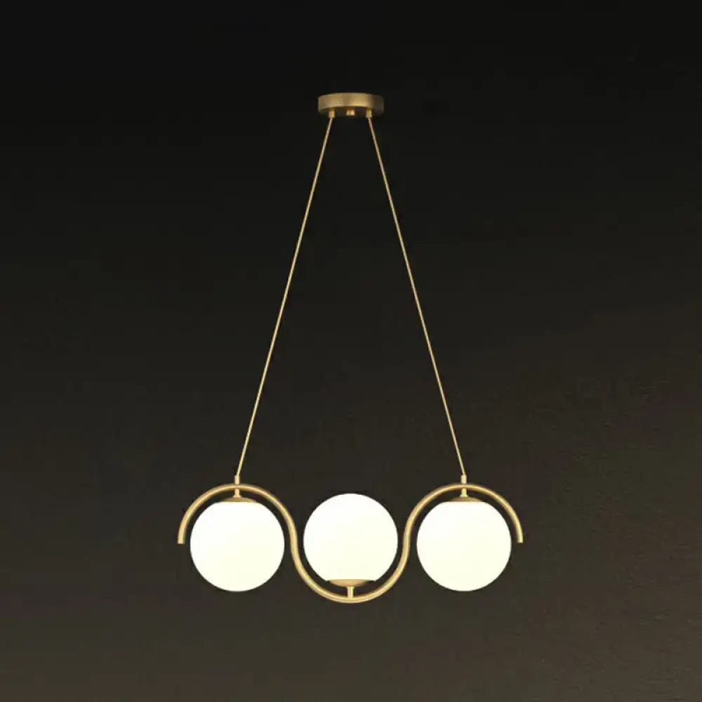 Decorbites postmodern island hanging lamp with clear milk white frosted glass shade and wavy brass pendant design