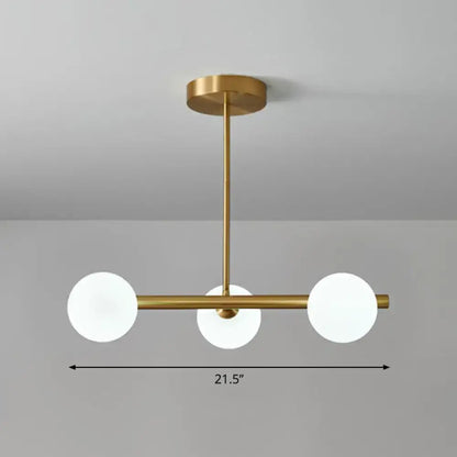 Decorbites™ postmodern linear island lamp featuring a modern brass pendant light with three frosted glass globes for dining room