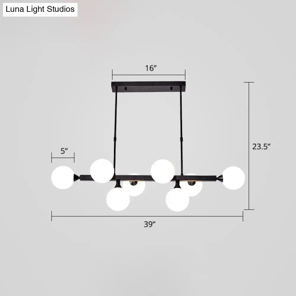 Black metal DecorBites™ dining room chandelier with six frosted opaline glass molecular globe lights